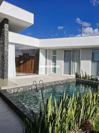 Imagem Casa Alto Padrão á venda no Condomínio Caledônia com 3 suítes, 4 vagas localizada em Camboriú.