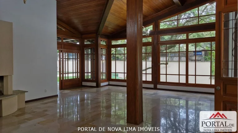 Imagem Casa a venda no condomínio Ipê da Serra, casa com armário e área de lazer com piscina. Venha conhecer no Portal de Nova Lima Imóveis - 31.98511-8000