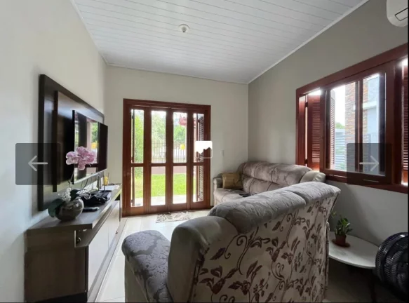 Casa de Dois quartos em Dois Irmãos com amplo espaço de pátio e localização excelente