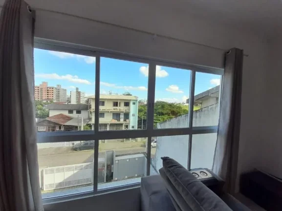 Imagem Apartamento com 1 suíte mas 1 dormitório no bairro Gravatá de Navegantes com churrasqueira a carvão e terraço a venda com Adriano Carpes Imóveis.
