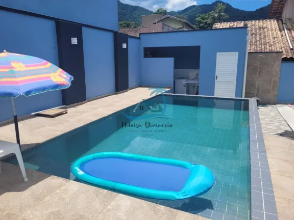 Imagem Sobrado em condomínio fechado com 3 suítes a venda em Ubatuba.