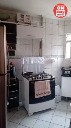 Imagem Apartamento com 2 dormitórios à venda, 64 m² por R$ 220.000,00 - Saboó - Santos/SP