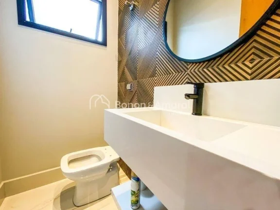 Imagem Casa térrea com 3 suítes, cozinha americana integrada às salas de estar e jantar, e área gourmet...