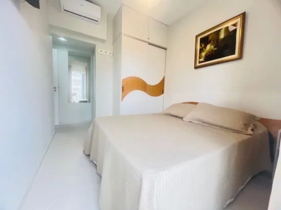 Imagem Apartamento à venda na Riviera de São Lourenço, no módulo 7: 3 quartos, 1 suíte, 2 salas, 2 vagas de garagem! Seu refúgio à beira-mar!