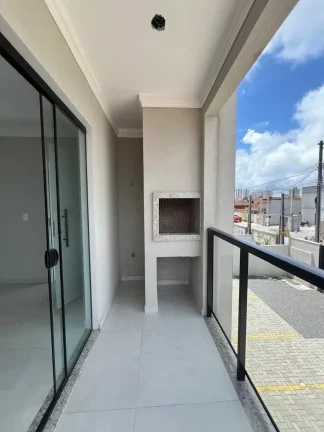 Imagem Geminado com 3 dormitórios sendo 1 suíte, sacada com churrasqueira e 1 vaga em Barra Velha