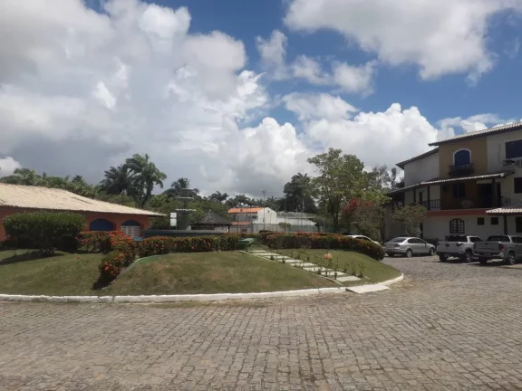 Imagem Village 3 Quartos Nascente com Vista Verde à Beira do Rio Joanes – Lazer Completo!”