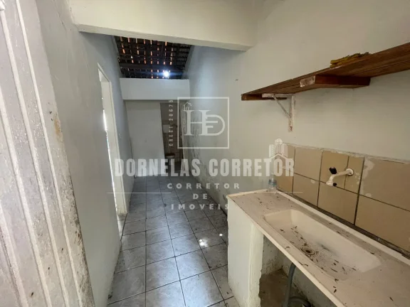 Imagem TERRENO COM 2 CASAS, 2 QUARTOS, 1 WC, ÁREA DE SERVIÇO E QUINTAL