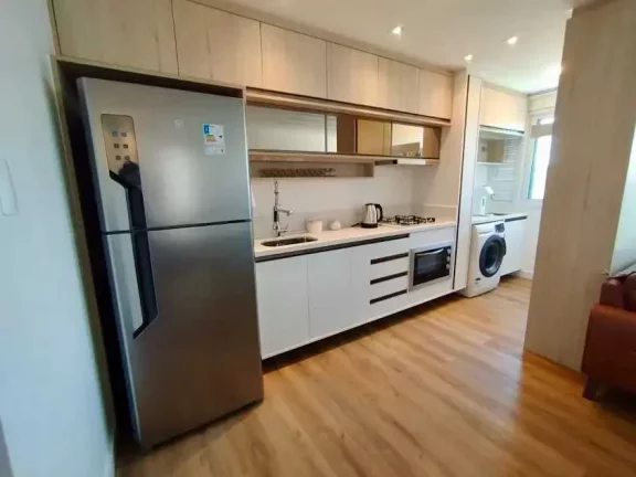Imagem Apartamento vista mar mobiliado com 2 dormitórios sendo 1 suíte e 1 vaga de garagem na Brava