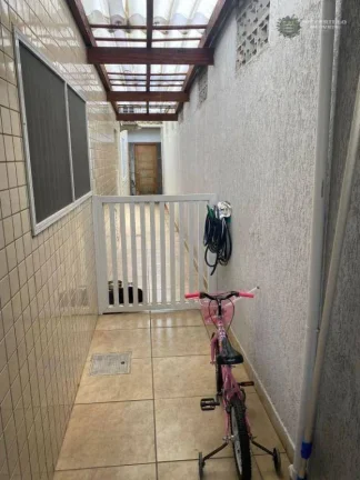 Imagem Sobrado com 3 dormitórios à venda, 180 m² por R$ 950.000,00 - Vila Guilhermina - Praia Grande/SP