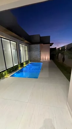 Imagem Luxuosa casa em condomínio à venda em Várzea Grande-MT, bairro Mirante do Pary: 3 quartos, 3 suítes, 3 salas, 5 banheiros, 4 vagas, 230m².