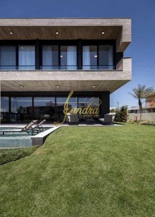 Imagem Casa condomínio com 05 suites e piscina beira de lago