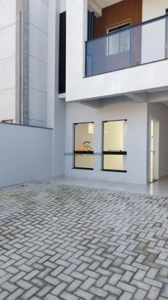 Imagem Sobrado de alto padrão, pronto para morar no bairro Meia Praia em Navegantes a venda com Adriano Carpes Imóveis