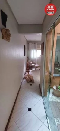 Imagem Sobrado à venda, 159 m² por R$ 1.350.000,00 - Embaré - Santos/SP