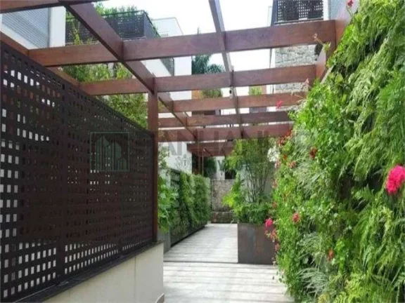 Imagem Vendo Belíssima casa de condomínio no Jd. Europa com 480 m² com 4 suítes e 4 vagas. Imóvel com projeto requintado em exclusivo condomínio de apenas 6