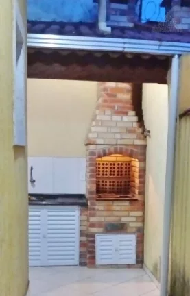 Imagem Casa térrea 3 dormitórios no bairro Tude Bastos