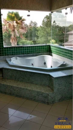Imagem CASA COND. FECHADO C/ 530M² | 4 SUÍTES | 6 VAGAS