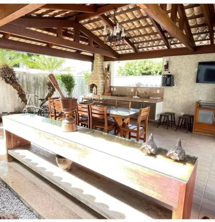 Imagem Casa em Condomínio para Venda em Natal, Candelária, 3 dormitórios, 3 suítes, 4 banheiros, 4 vagas