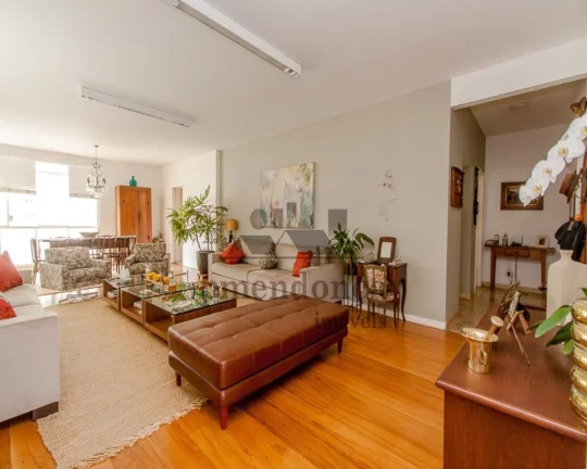Imagem living para 2 ambientes integrado som a sala de jantar, lavabo, 3 dormitórios sendo 1