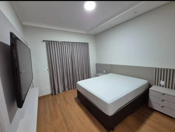 Imagem Imperdível oportunidade de adquirir casa de luxo em Votorantim-SP, no Alphaville Nova Esplanada 3, com 4 quartos, 3 suítes, 4 vagas de garagem e 204,10 m² de área.