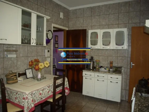 Imagem Casa bairro Campos Eliseos vende, R$ 450.000 com 3 dormitórios (1 suíte), 2 vagas, piscina - Ribeirão Preto - SP