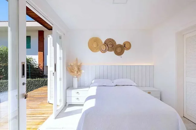 Imagem Casa com 3 dormitórios sendo 2 suítes com jardim e piscina Praia de Taquaras, Balneário Camboriú SC