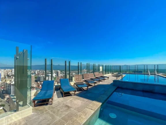 Apartamento à venda na Vila Guilhermina, Praia Grande-SP: 2 quartos, 2 suítes, 2 banheiros, 2 vagas, 95m²!