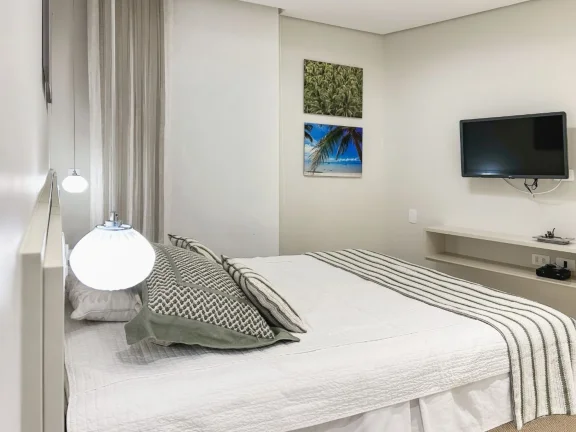 Imagem Apartamento de Luxo à venda na Riviera de São Lourenço Módulo 03: 3 suítes, varanda gourmet e vista para o mar. Venha conferir!