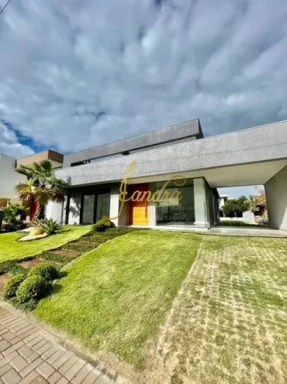Imagem Casa térrea em condomínio fechado com 04 suites