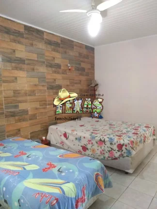 Imagem CASA À VENDA COM 3 SUÍTES ITANHAÉM