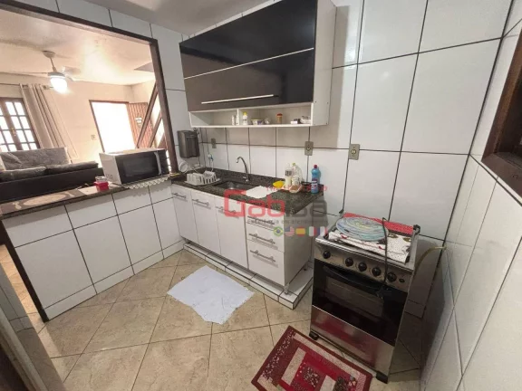 Imagem Casa com 2 dormitórios à venda, 77 m² por R$ 320.000,00 - Peró - Cabo Frio/RJ