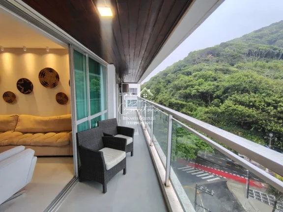 Imagem Apartamento atualizado e reformado com vista para o mar e lazer, 3 quartos com suíte e 2 vagas na Pitangueiras, Guarujá-SP - 165m² de área.