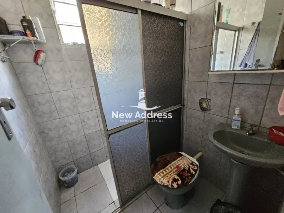 Imagem Casa 2 quartos à venda em Enseada de Jacaraípe, murada e gradeada, ideal para quem busca praticidade e quintal.