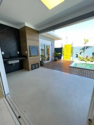 Imagem Casa alto padrão 3 dormitórios sendo 1 suíte e 2 vagas de garagem em Palhoça/SC