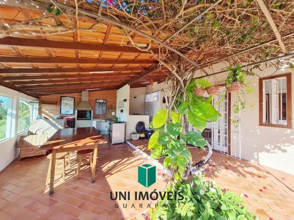 Imagem Linda casa com piscina, jardim e 902m² de terreno a venda na Enseada Verde - Guarapari