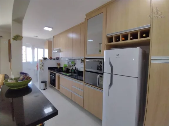 Imagem Apartamento na Vila Tupi, 1 Quarto com Sacada Gourmet, 53m² de área útil.