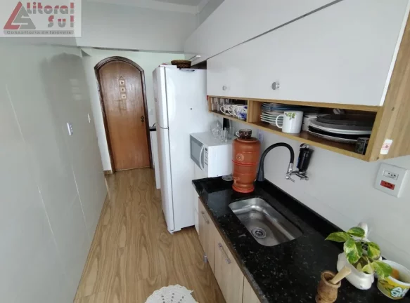 Imagem Apartamento à venda em Praia Grande-SP, bairro Mirim: 1 quarto, 1 sala, 1 banheiro, 1 vaga, 40m² de área.