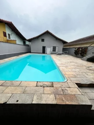 Imagem Vendo casa com 362 mts de área útil, piscina 4x7, barzinho de tijolinho e mármore + EDÌCULA com 2 dormitórios, banheiro Sistema de captação de energia própria fotovoltáica