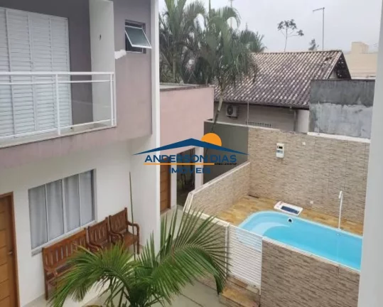 Imagem Casa com 2 dormitórios à venda, 112m² por R$ 410.000 - Massaguaçu - Caraguatatuba/SP