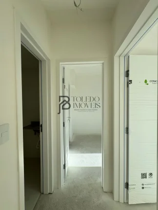 Imagem Apartamento de 2 dormitórios sendo 1 suíte, prédio frente mar no bairro Vila Mirim - Praia Grande