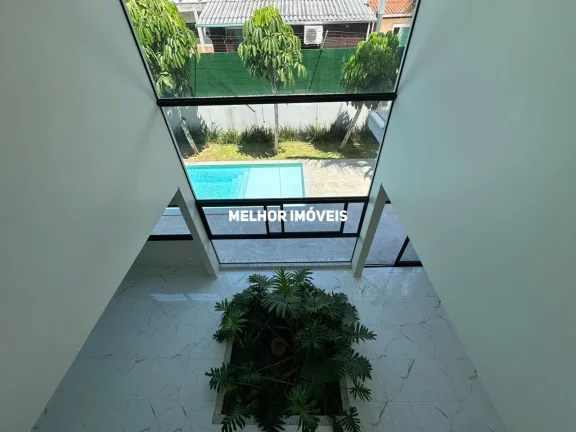 Imagem Casa em Condomínio fechado 4 suítes 4 vagas em Balneário Camboriú.