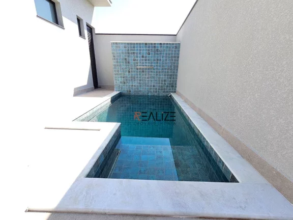 Imagem Casa com 3 suítes e piscina à venda, 155 m² por R$ 1.420.000 - Condomínio Jardim Brescia - Indaiatuba/SP