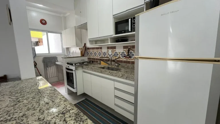 Imagem APARTAMENTO PRAIA GRANDE com 2 dormitórios sendo 1 suíte,1 vaga de garagem,varanda gourmet com churrasqueira e quintal
