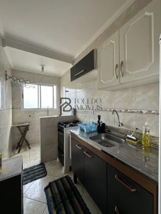 Imagem Apartamento PORTEIRA FECHADA, 01 dormitório, com sacada e 41 m² de área útil - LAZER COMPLETO - Mirim/PG