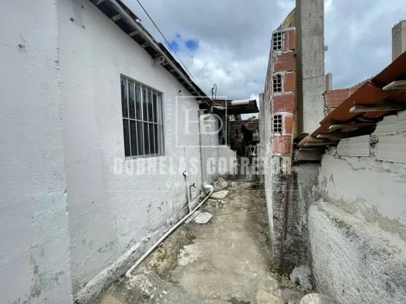 Imagem Oportunidade! Terreno + 3 Casas Prontas para Morar ou Alugar