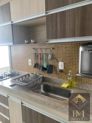 Imagem APARTAMENTO NO BOQUEIRÃO FRENTE MAR COM VARANDA E PORTEIRA F