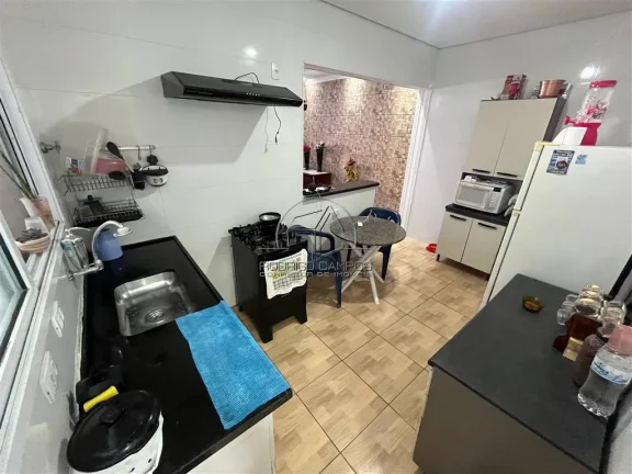 Imagem Casa Geminada Térrea com Piscina e 3 Quartos no Tupi, Praia Grande