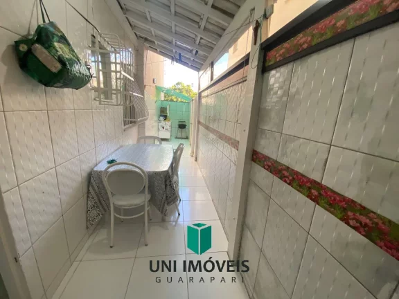 Imagem Apartamento Primeiro andar à Venda em Guarapari - Frente para rua - com área externa lateral