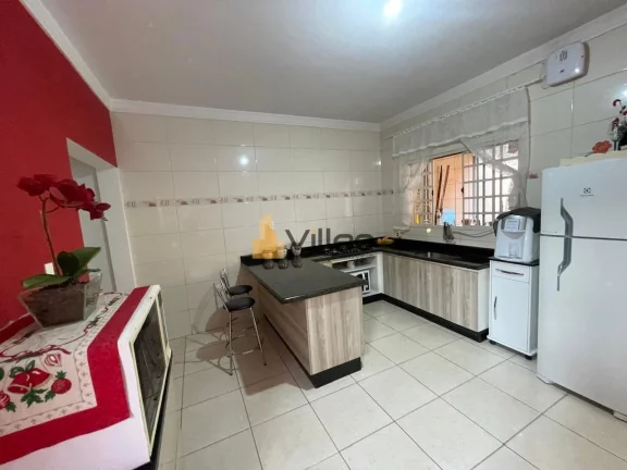 Imagem Descubra uma rara oportunidade de viver com elegância e praticidade em um sobrado moderno e bem dis...
