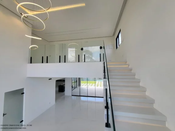 Imagem Casa de alto padrão em condomínio à venda em Camaçari-BA, 4 quartos, 4 suítes, 3 salas, 1 banheiro, 4 vagas, 267m².