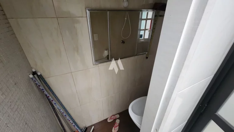 Imagem Venda de Casa/Sobrado no Embaré, Santos - Oportunidade Única em Localização Privilegiada